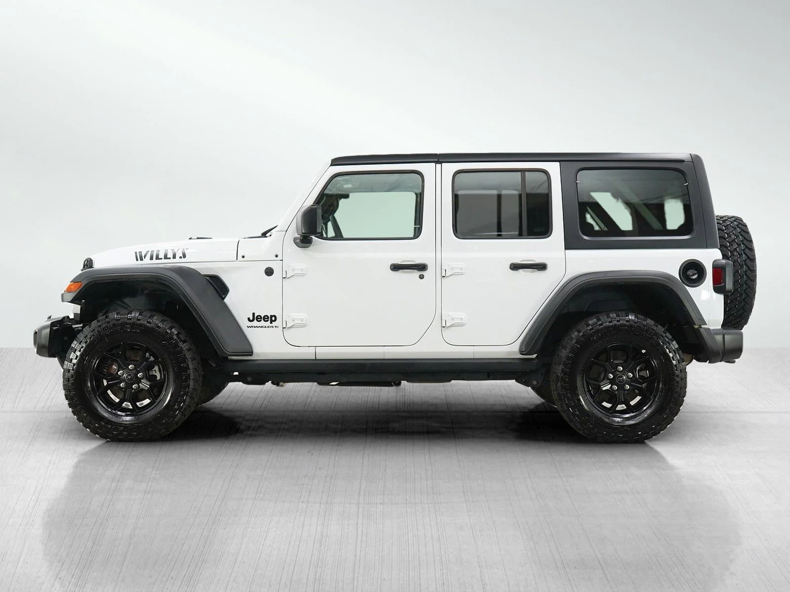 Used 2025 Jeep Wrangler 4-Door Willys with VIN 1C4PJXDN0SW597421 for sale in Minneapolis, Minnesota