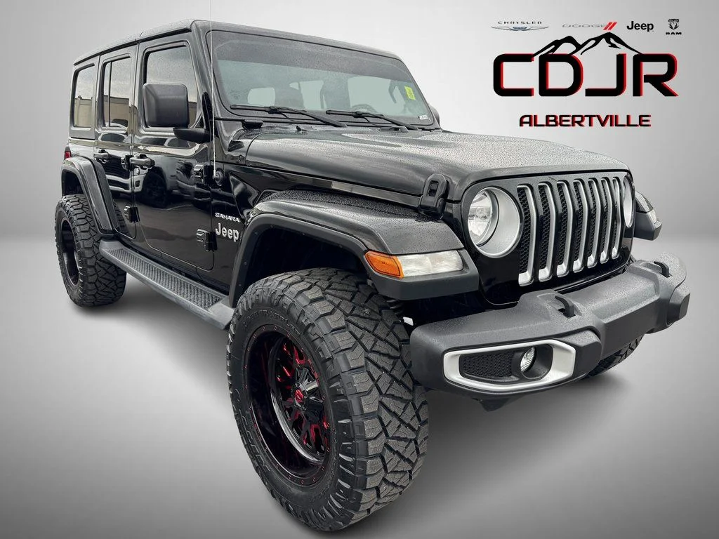 Used 2020 Black Jeep Unlimited Sahara image 1