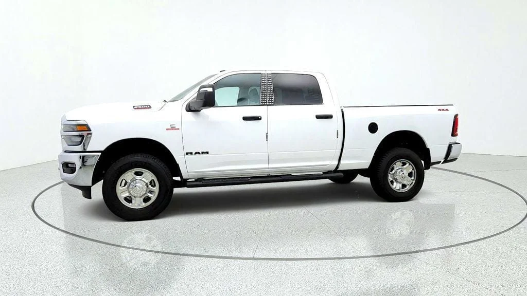 Used 2025 Bright White Clearcoat Ram Tradesman 4x4 Crew Cab 6