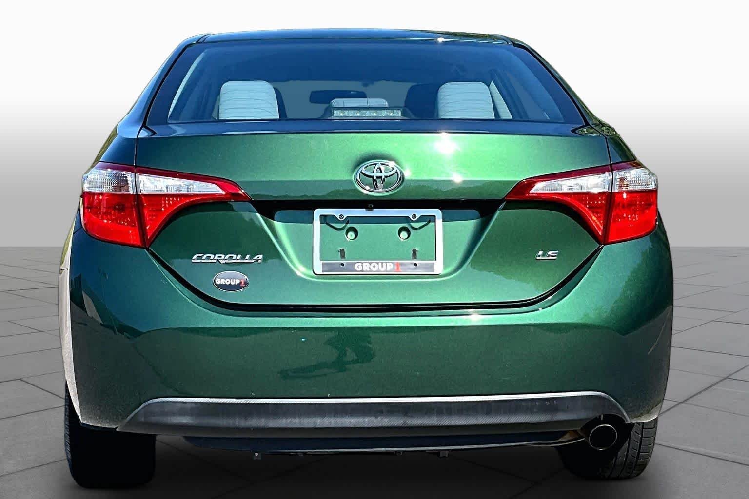 Used 2016 4Evergreen Metallic Toyota LE image 5