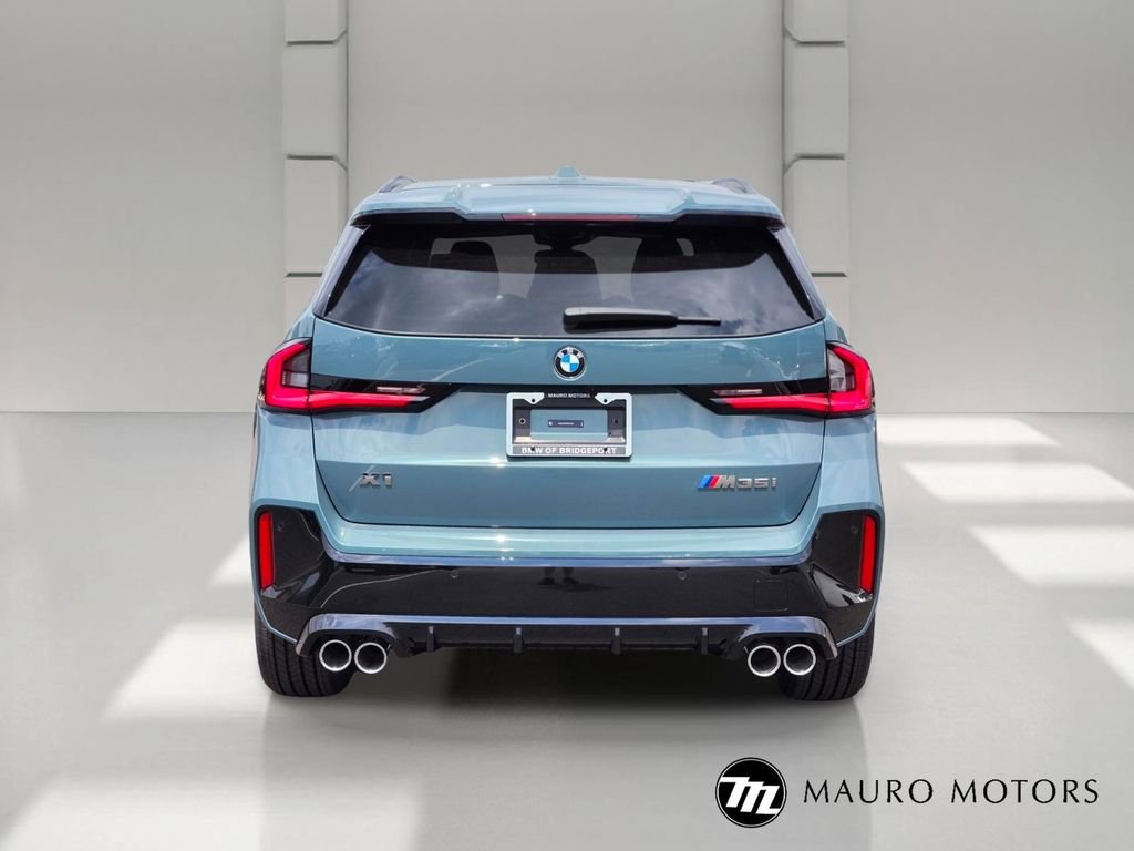 New 2026 Green BMW M35i image 4