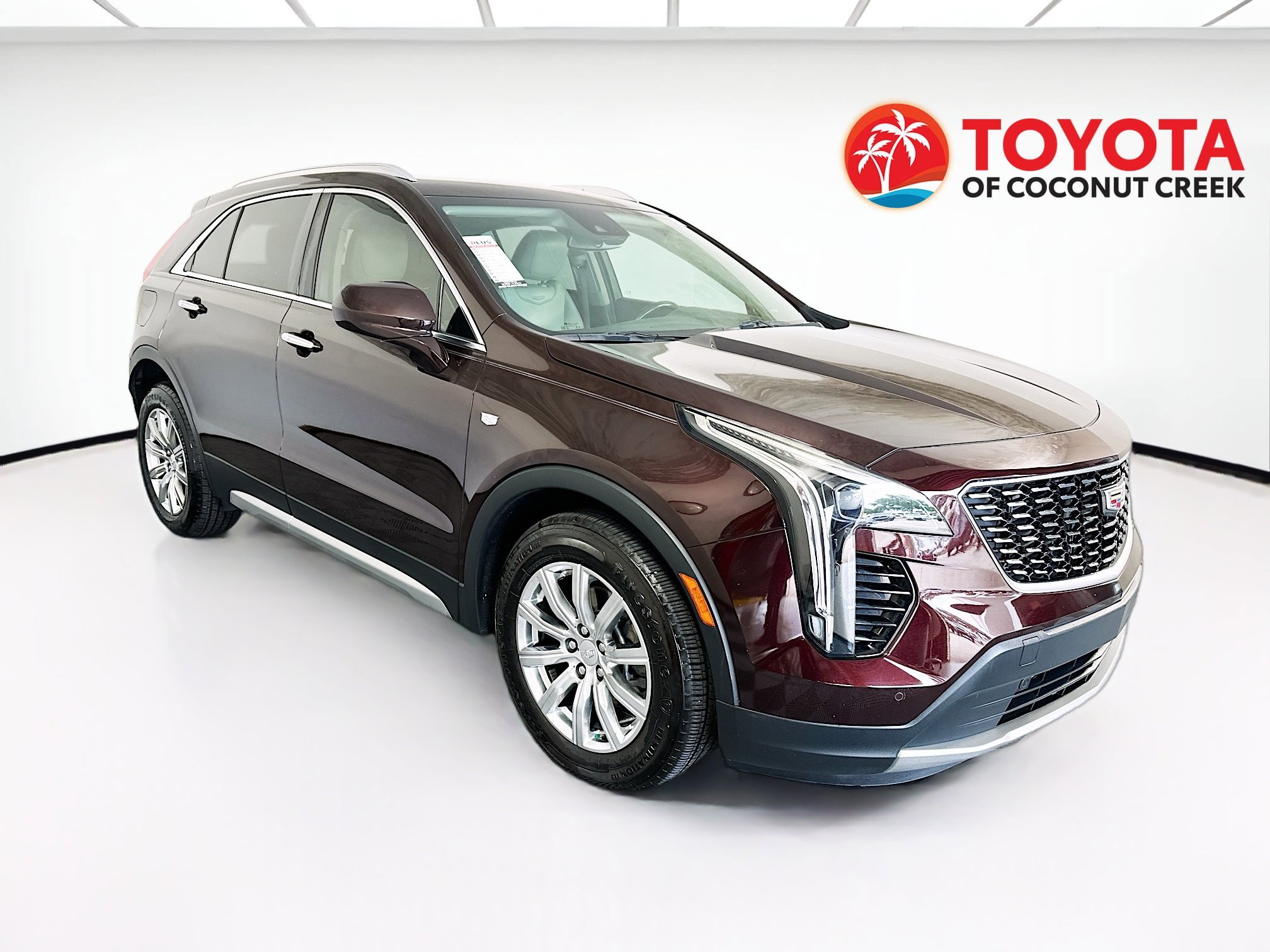 Used 2020 Garnet Metallic Cadillac FWD Premium Luxury image 1