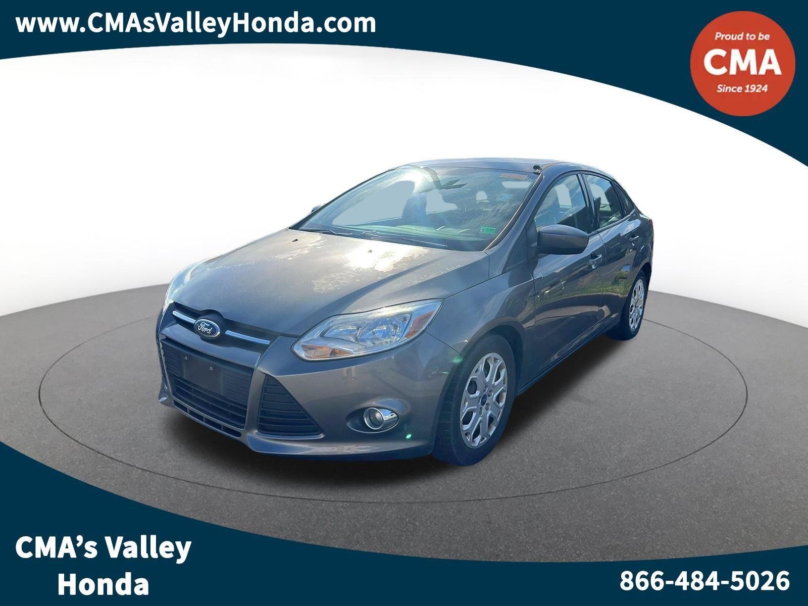 Used 2012 Sterling Gray Metallic Ford SE image 1
