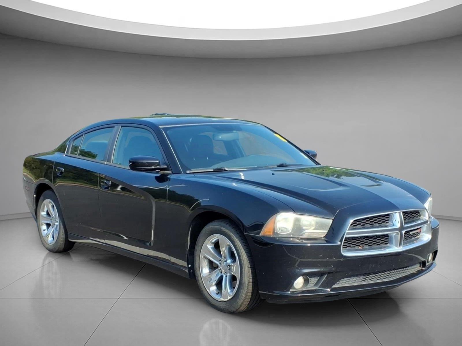 Used 2012 Pitch Black Dodge SXT image 1