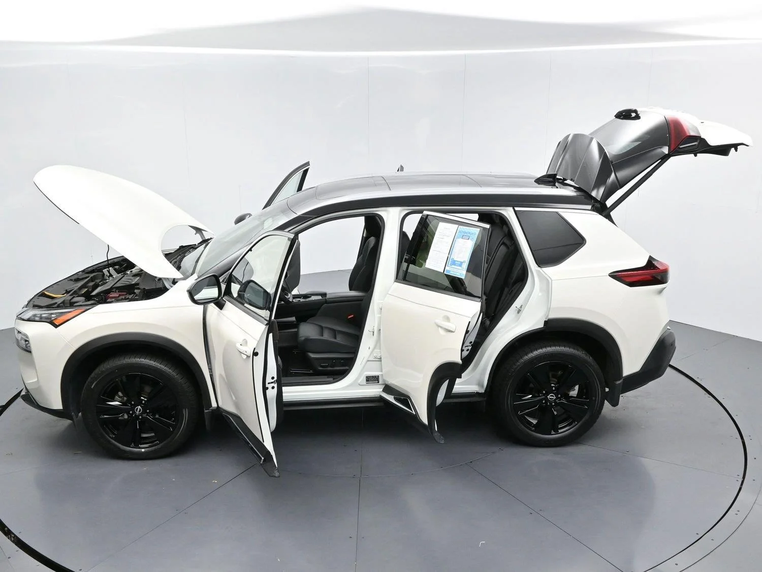 Used 2023 Pearl White Tricoat/Super Black Nissan SL image 41