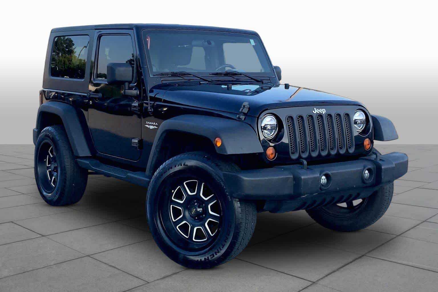 Used 2010 Black Jeep Sport image 2