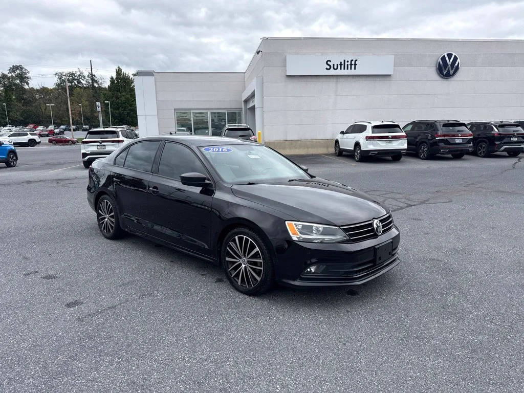 Used 2016 Black Uni Volkswagen 1.8T Sport image 1