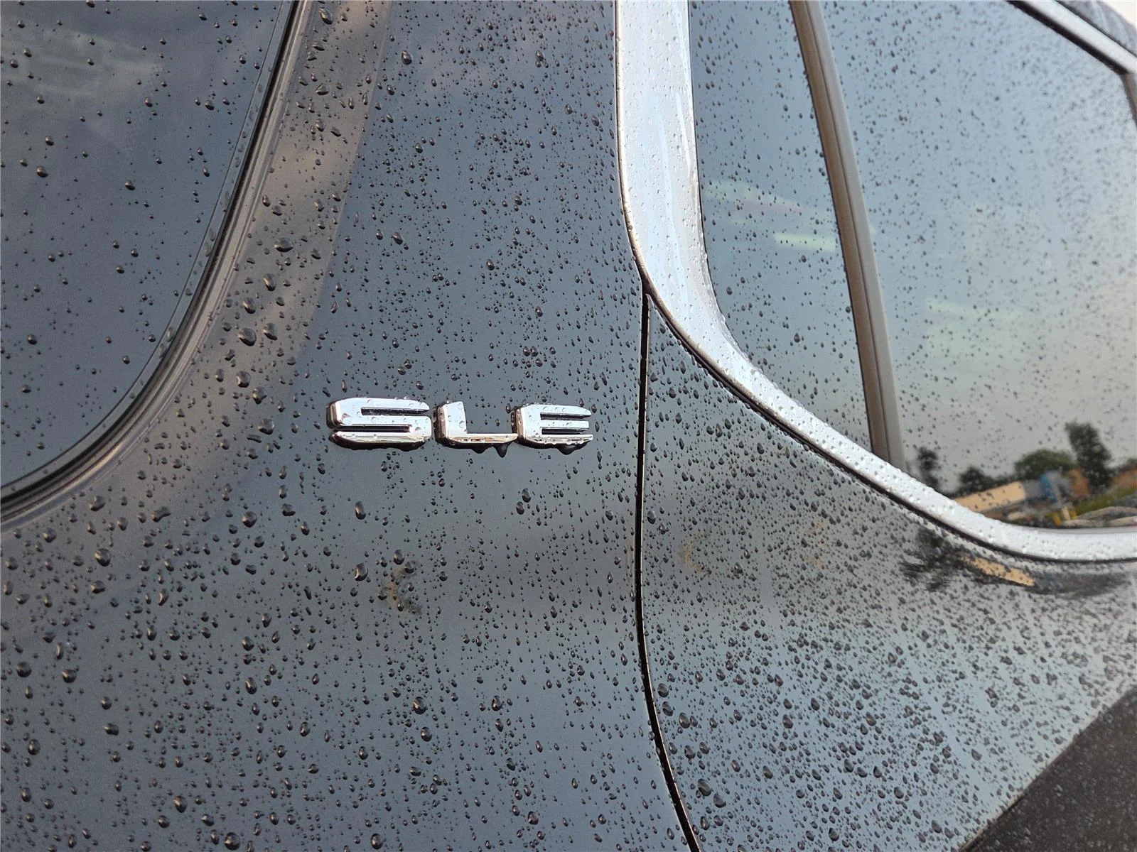 Used 2023 Ebony Twilight Metallic GMC SLE image 31