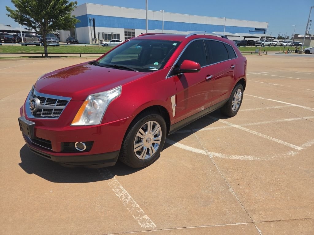 Used 2010 Red Cadillac Luxury image 1