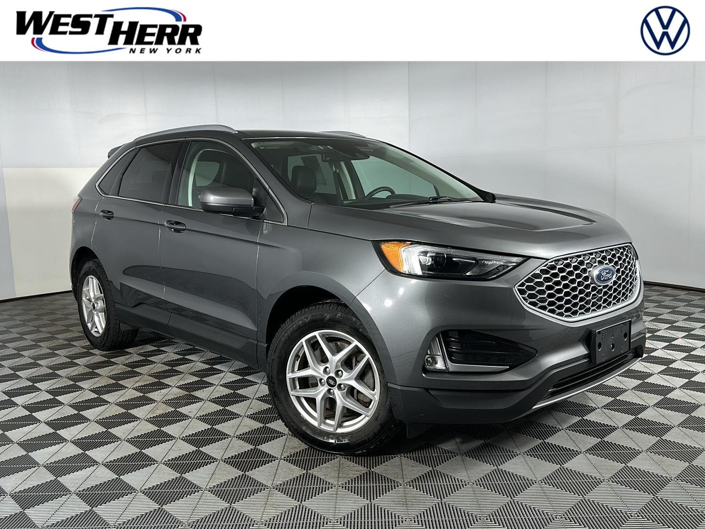 Used 2024 Carbonized Gray Ford SEL image 1