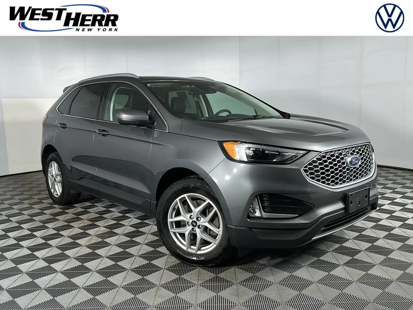 Used 2024 Carbonized Gray Ford SEL image 1