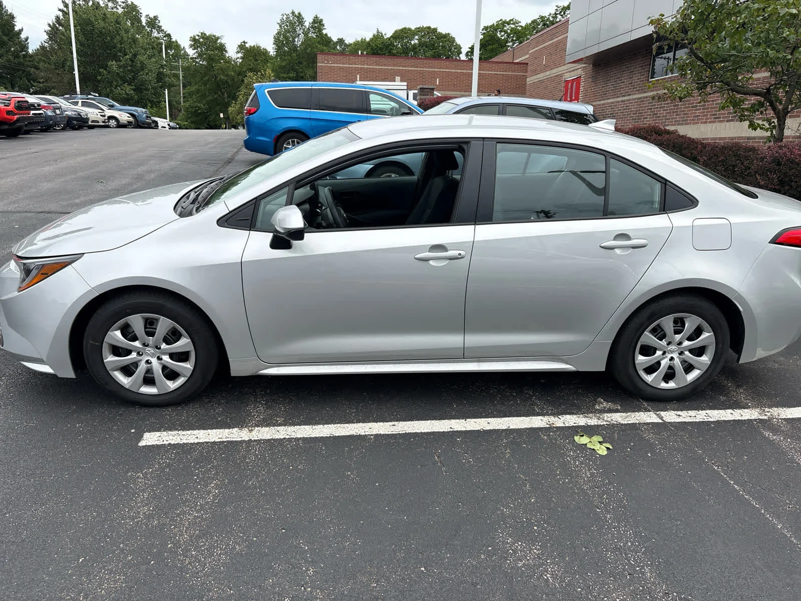 Used 2026 Classic Silver Metallic Toyota LE image 4