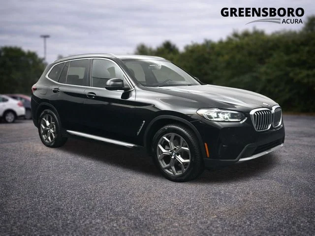 Used 2022 Black BMW xDrive30i image 1