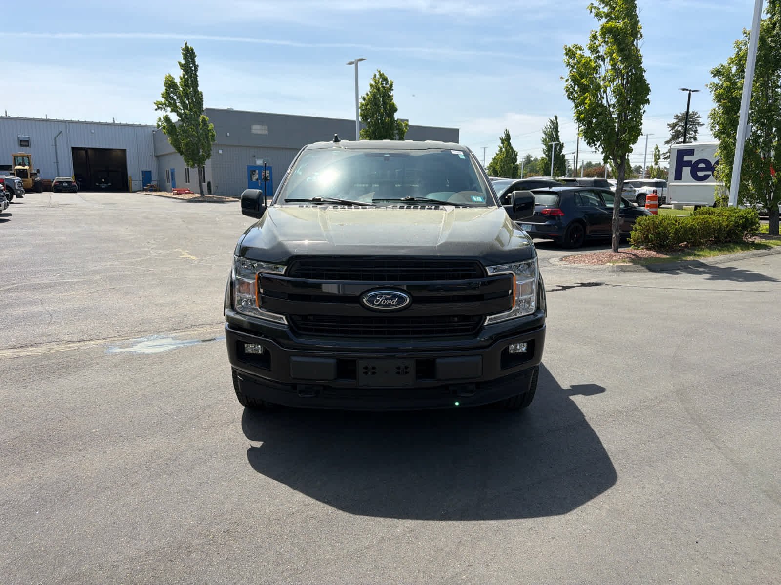 Used 2020 Agate Black Metallic Ford LARIAT image 2