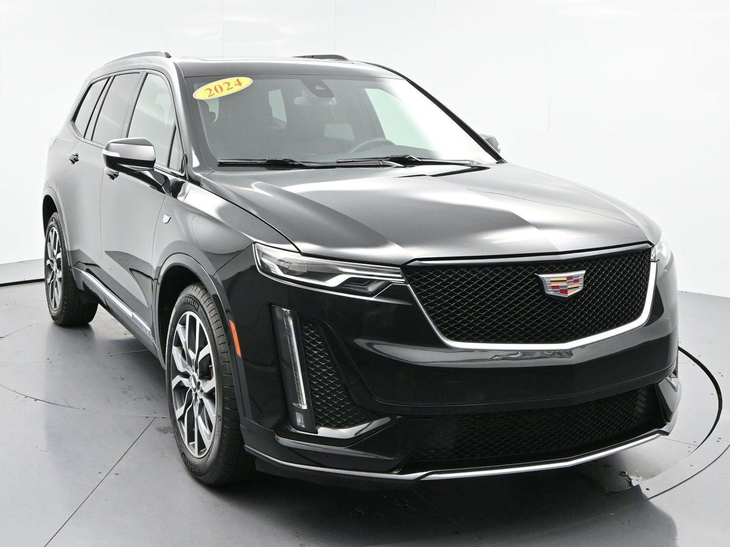 Used 2024 Stellar Black Metallic Cadillac Sport image 2