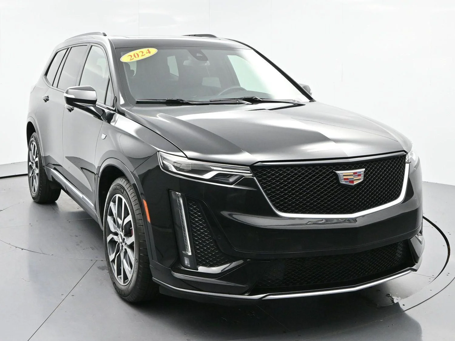 Used 2024 Stellar Black Metallic Cadillac Sport image 2