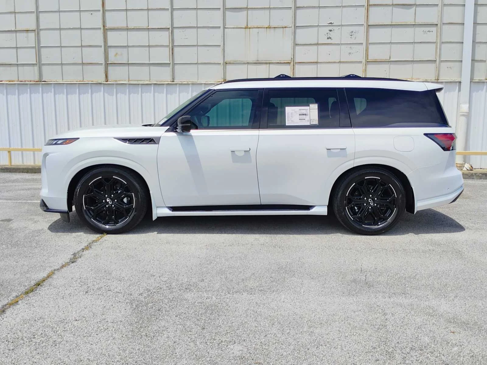 New 2026 RADIANT WHITE INFINITI Sport 4WD image 4