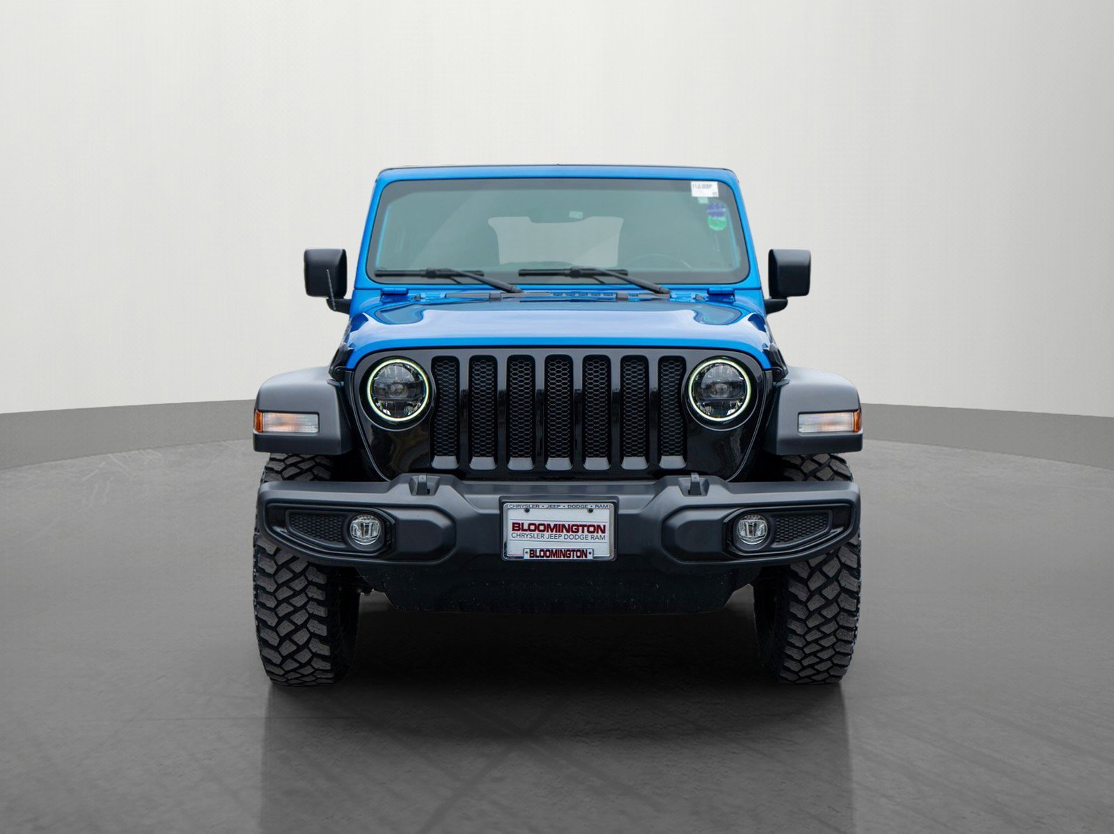 Used 2023 Jeep Wrangler 4-Door Willys with VIN 1C4HJXDNXPW575843 for sale in Minneapolis, Minnesota