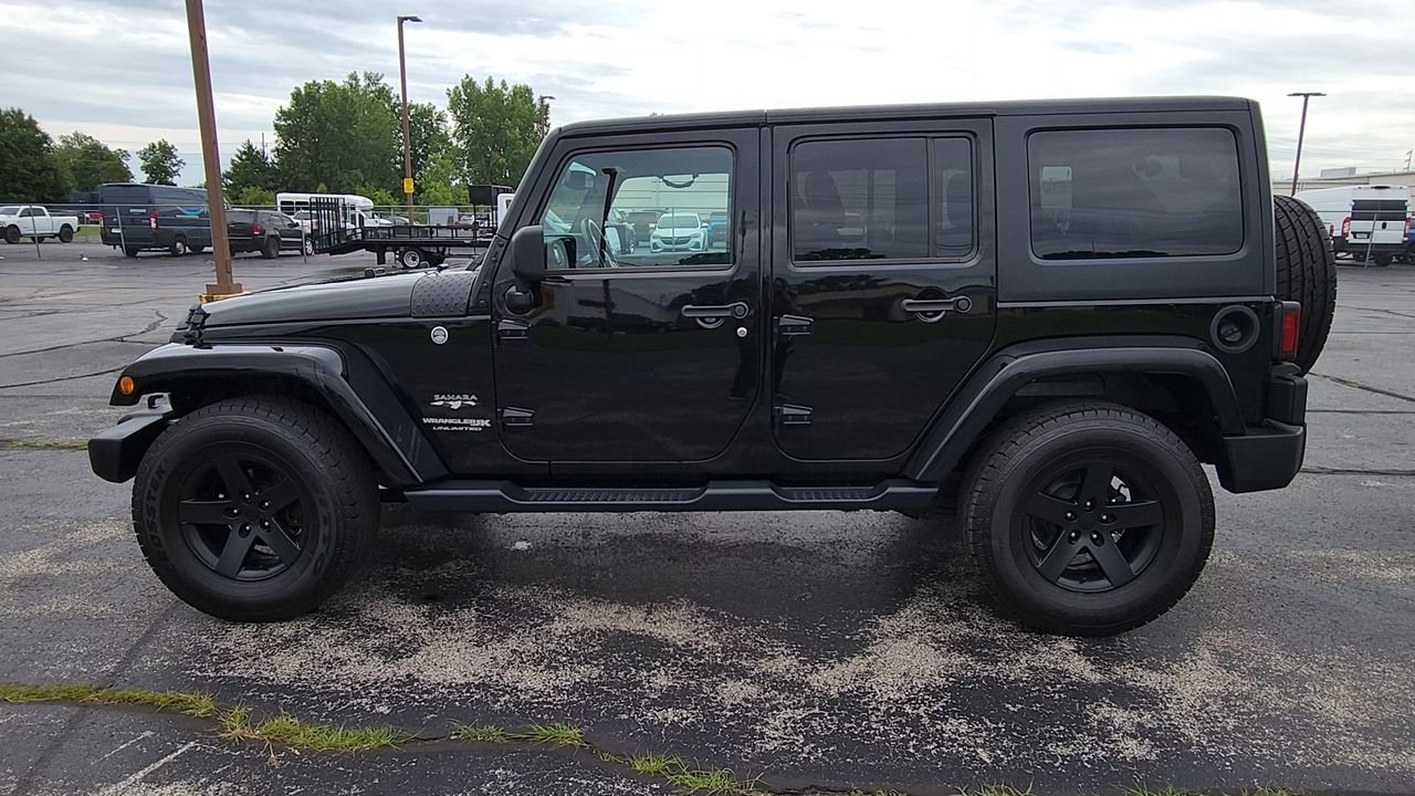 Used 2018 Black Clearcoat Jeep Sahara image 5