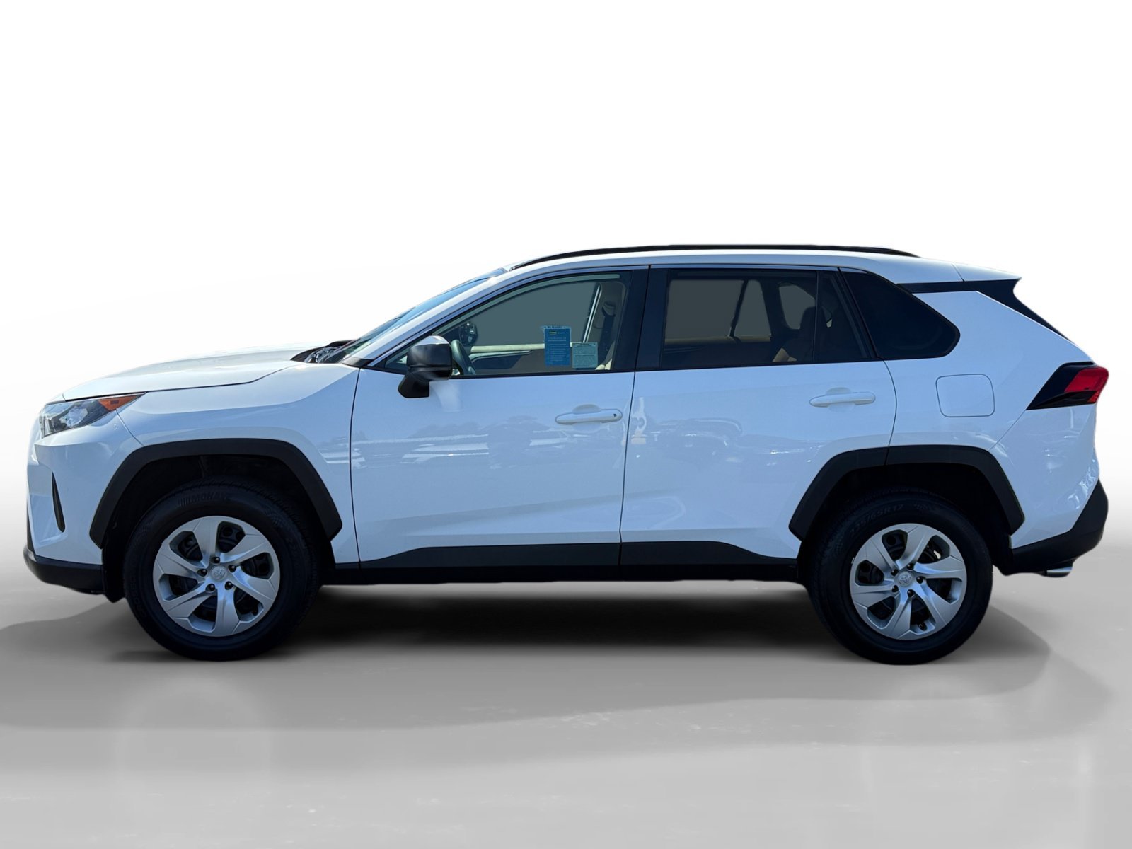 Used 2021 Super White Toyota LE image 2