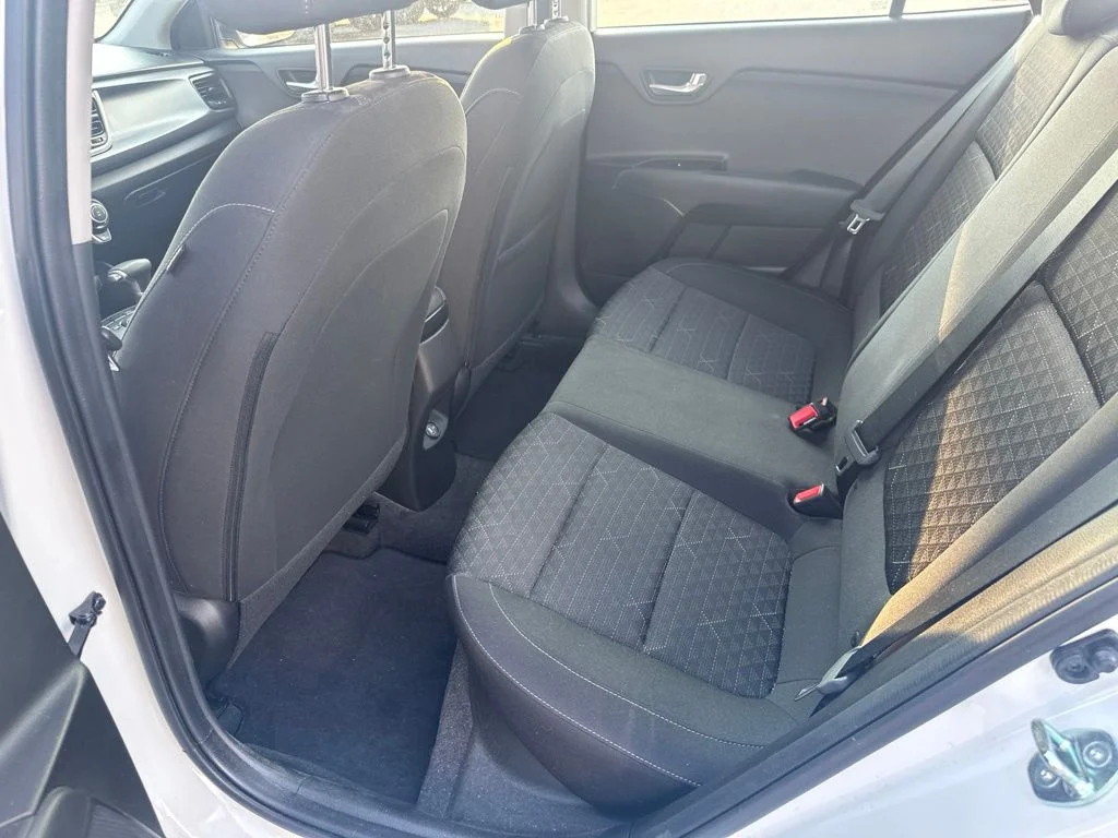 Used 2023 Clear White Kia S image 11