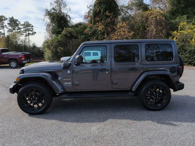 Used 2022 Jeep Wrangler Unlimited Sahara 4XE with VIN 1C4JJXP62NW129057 for sale in Wilmington, NC