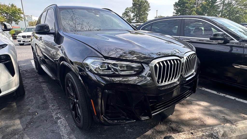 Used 2023 Black Sapphire Metallic BMW xDrive30i image 1