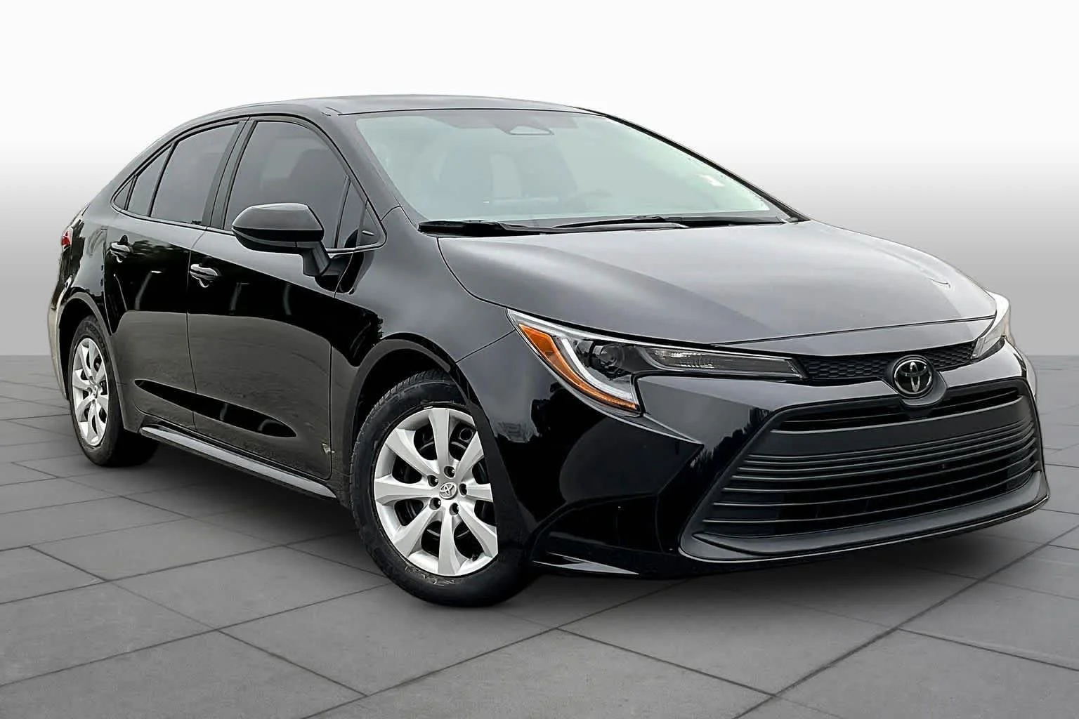 Used 2024 Midnight Black Metallic Toyota LE image 3