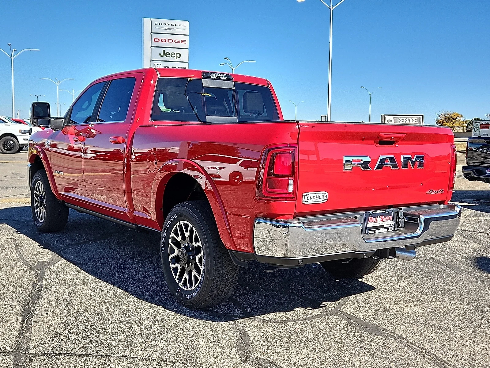 New 2026 Flame Red Ram LIMITED LONGHORN CREW CAB 4X4 6