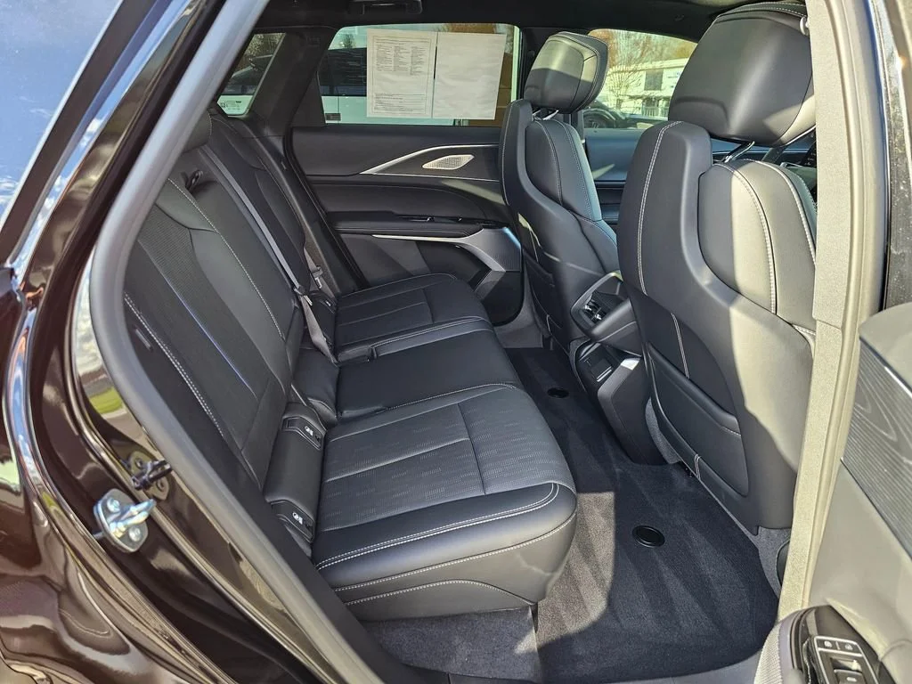 Used 2025 Stellar Black Metallic Cadillac Sport 2 image 13