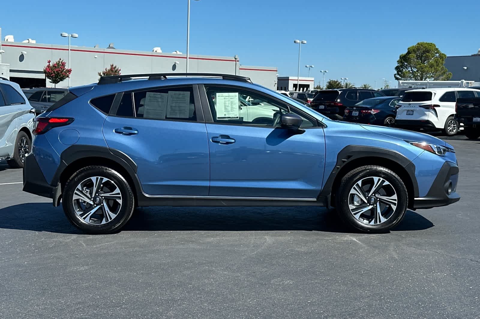 Used 2024 Horizon Blue Pearl Subaru Premium image 6