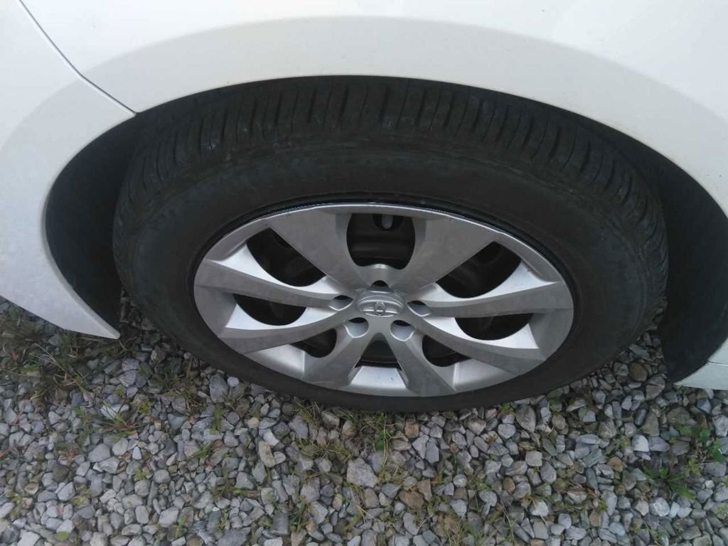 Used 2024 White Toyota LE image 4