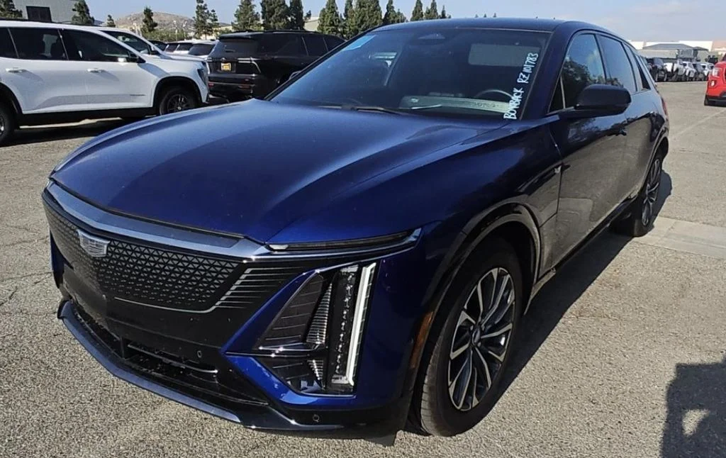 Used 2024 Blue Cadillac Sport image 1