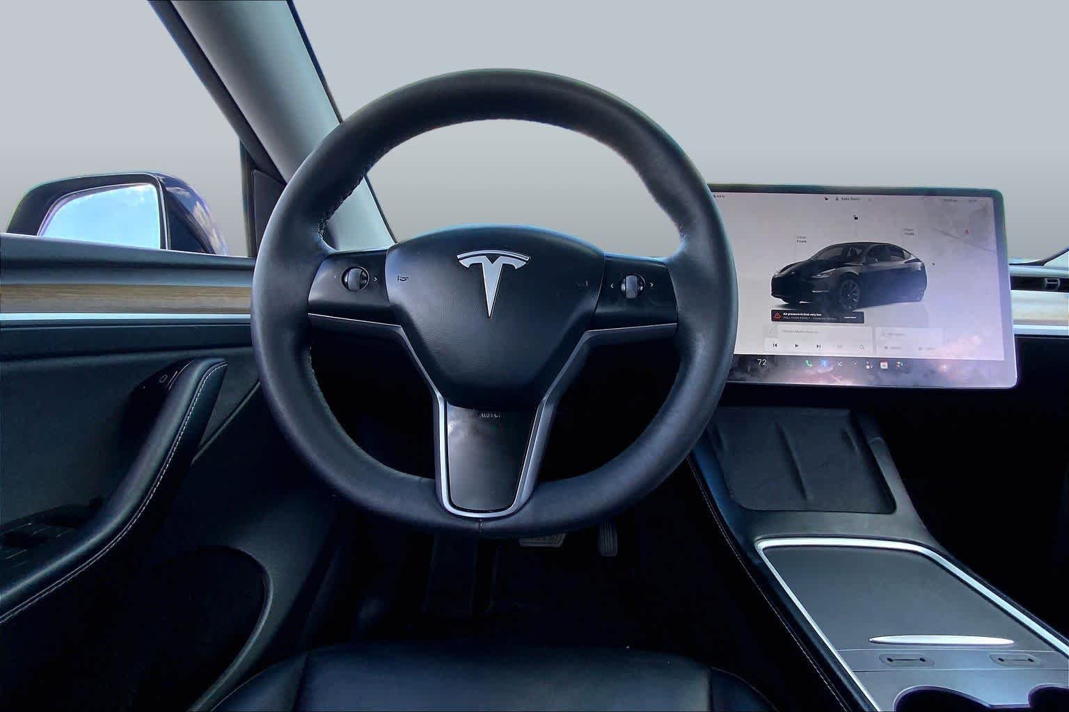 Used 2024 Solid Black Tesla  image 5