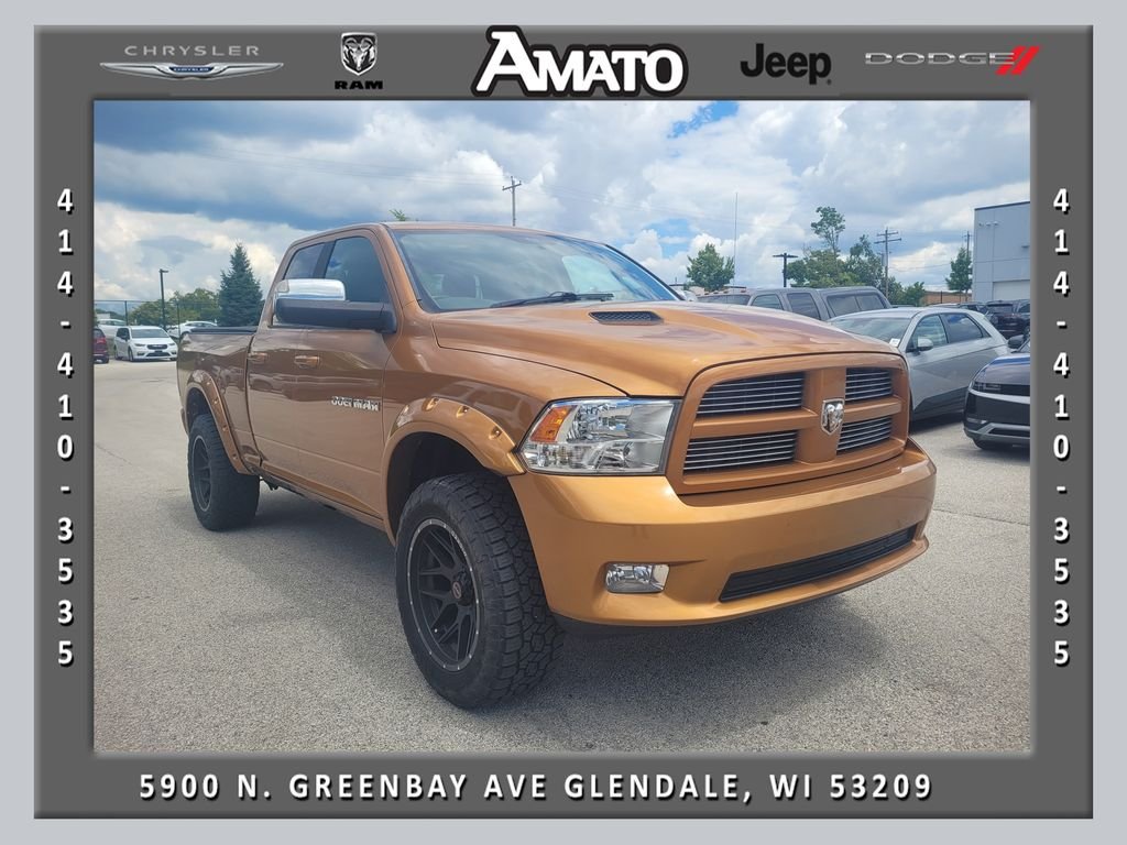 Used 2012 Orange Ram Sport image 1