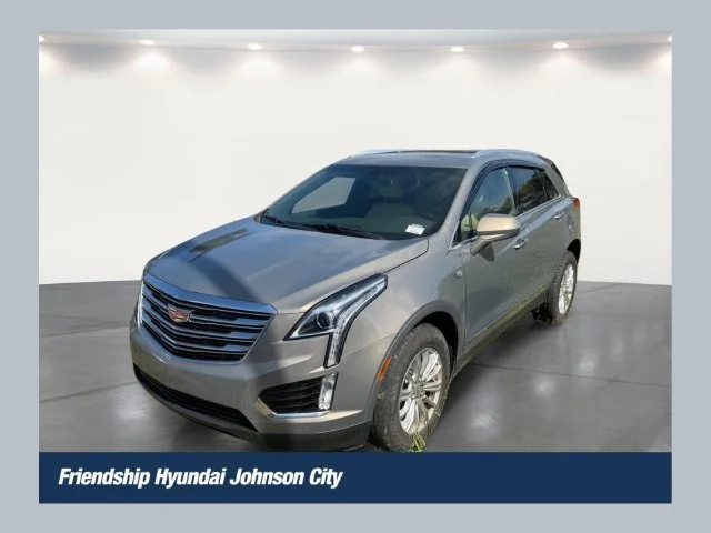 Used 2019 Brown Cadillac Base image 1