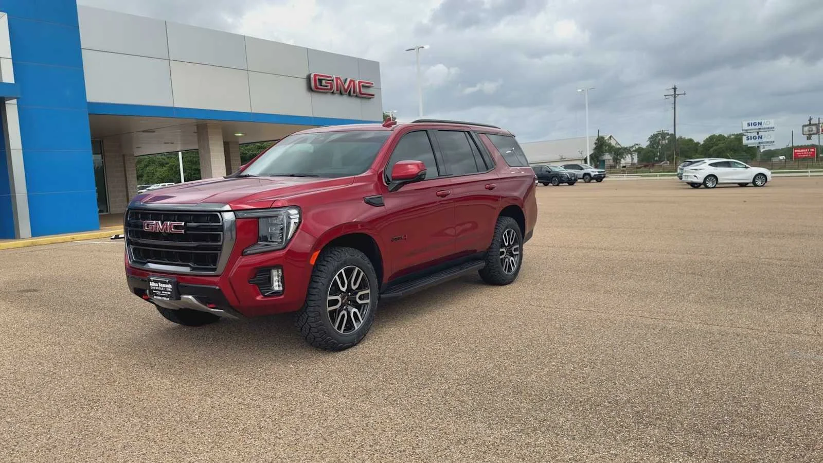 Used 2024 Volcanic Red Tintcoat GMC AT4 image 4