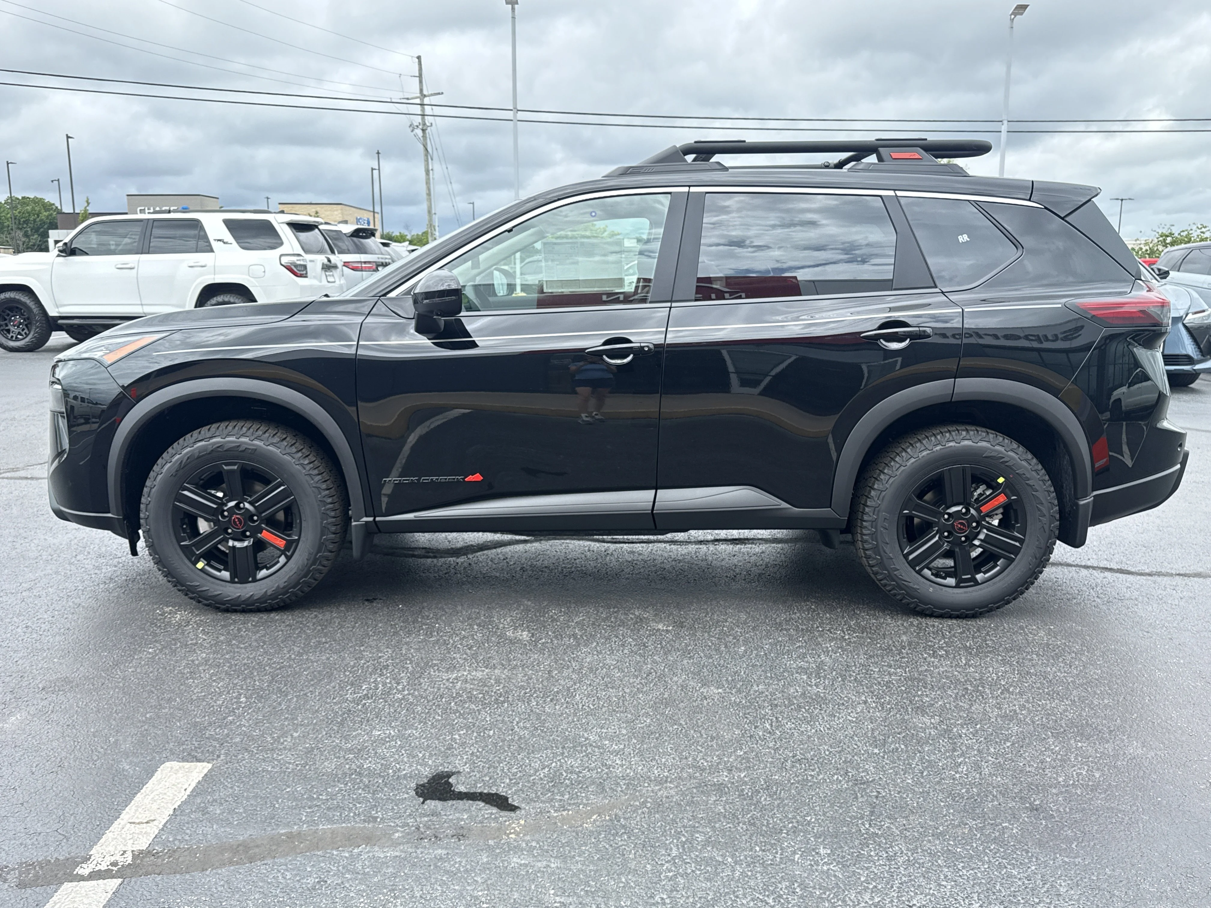 New 2026 Super Black Nissan Rock Creek AWD image 9