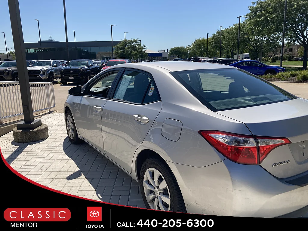 Used 2014 Classic Silver Metallic Toyota LE image 2