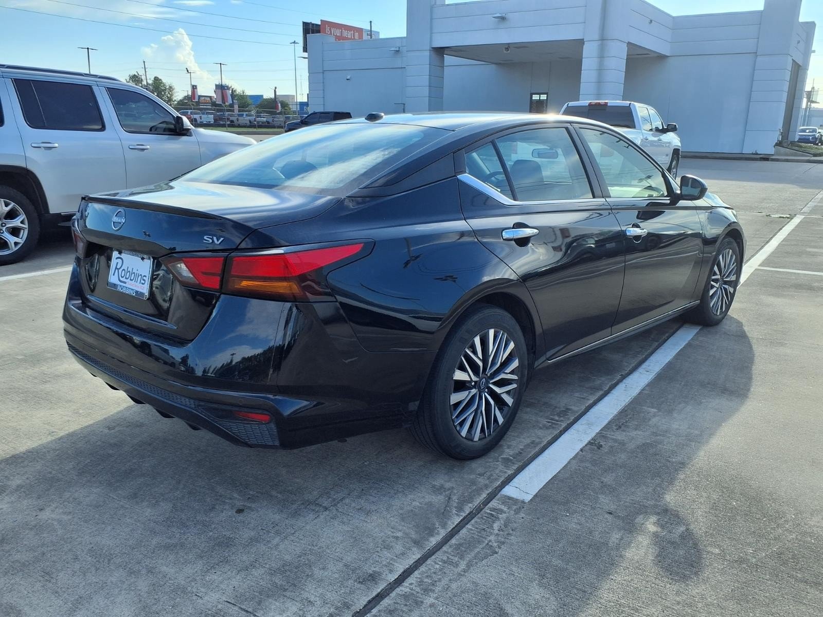 Used 2024 Super Black Nissan 2.5 SV image 4