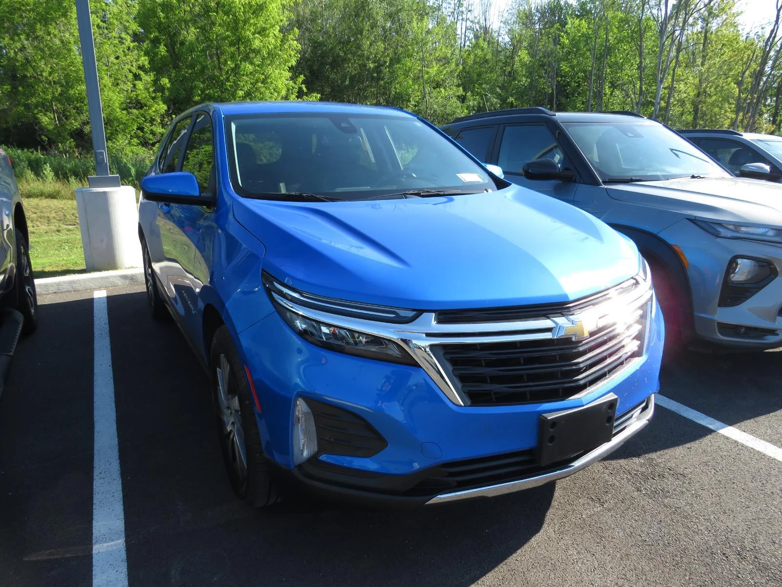 Used 2024 Riptide Blue Metallic Chevrolet LT image 2