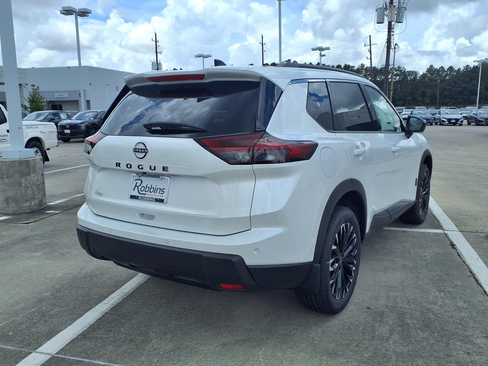 2026 Nissan Rogue Dark Armor™ White at Robbins Nissan