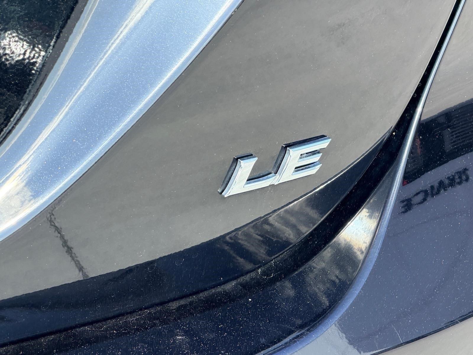 Used 2024 Midnight Black Metallic Toyota LE image 6