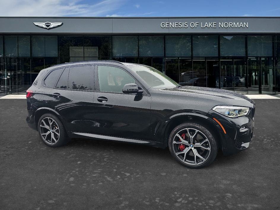 Used 2021 Black Sapphire Metallic BMW M50i image 3