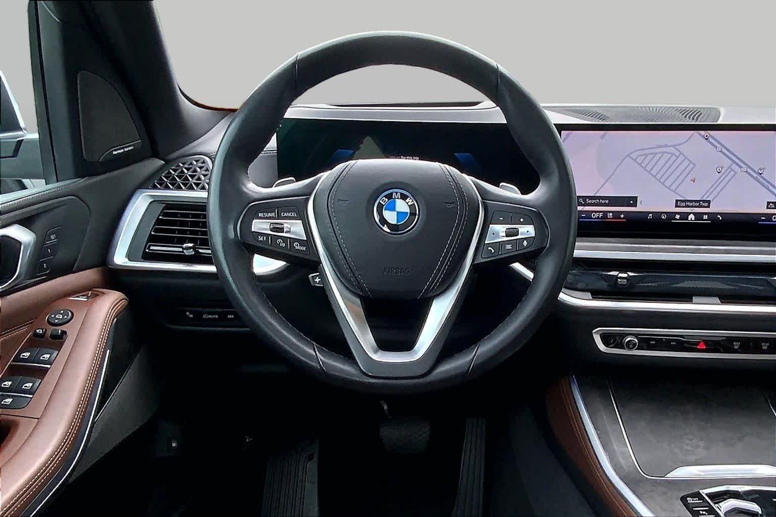 Used 2024 Mineral White Metallic BMW xDrive50e image 5