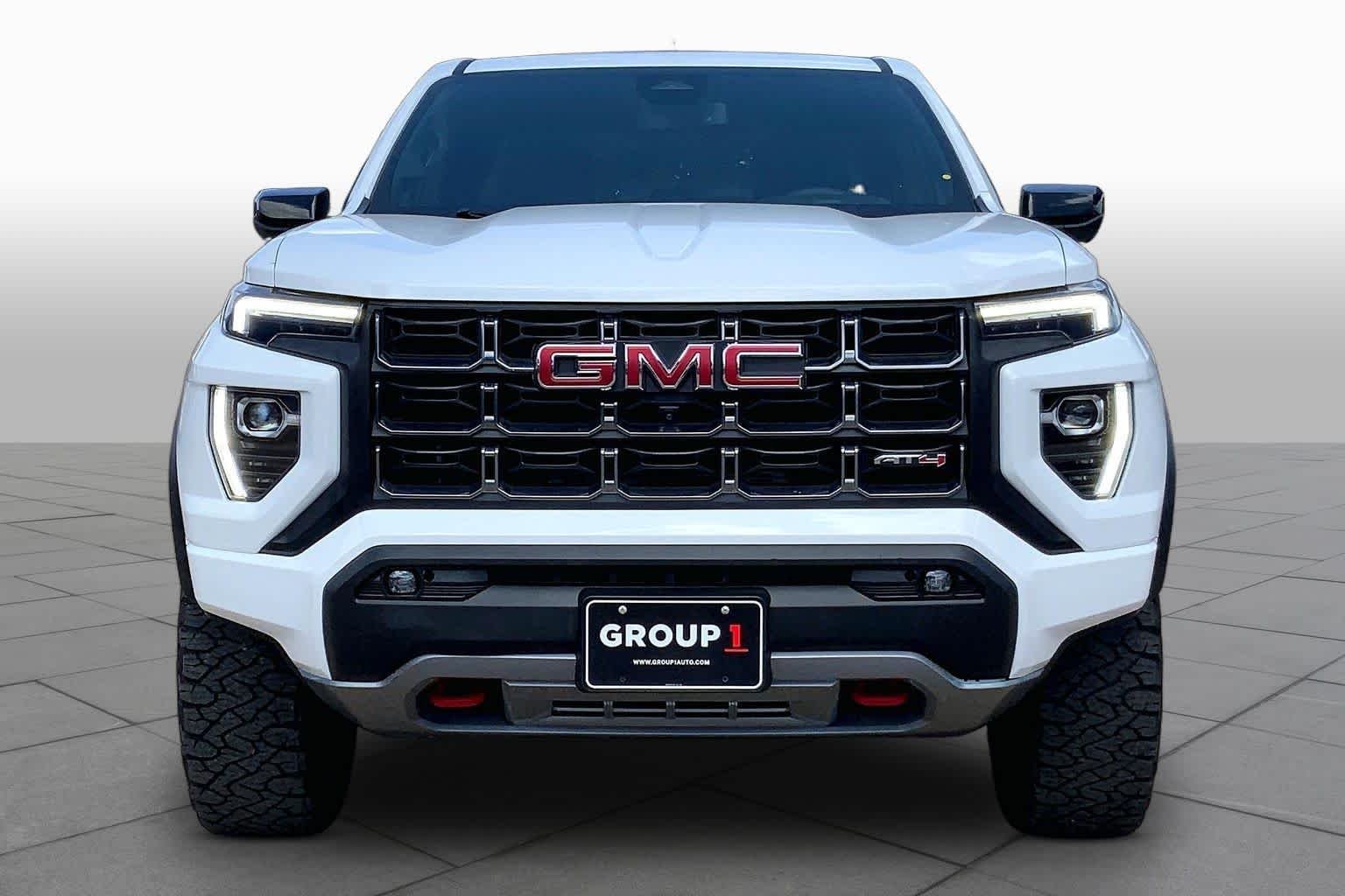 Used 2024 Summit White GMC 4WD AT4 image 4