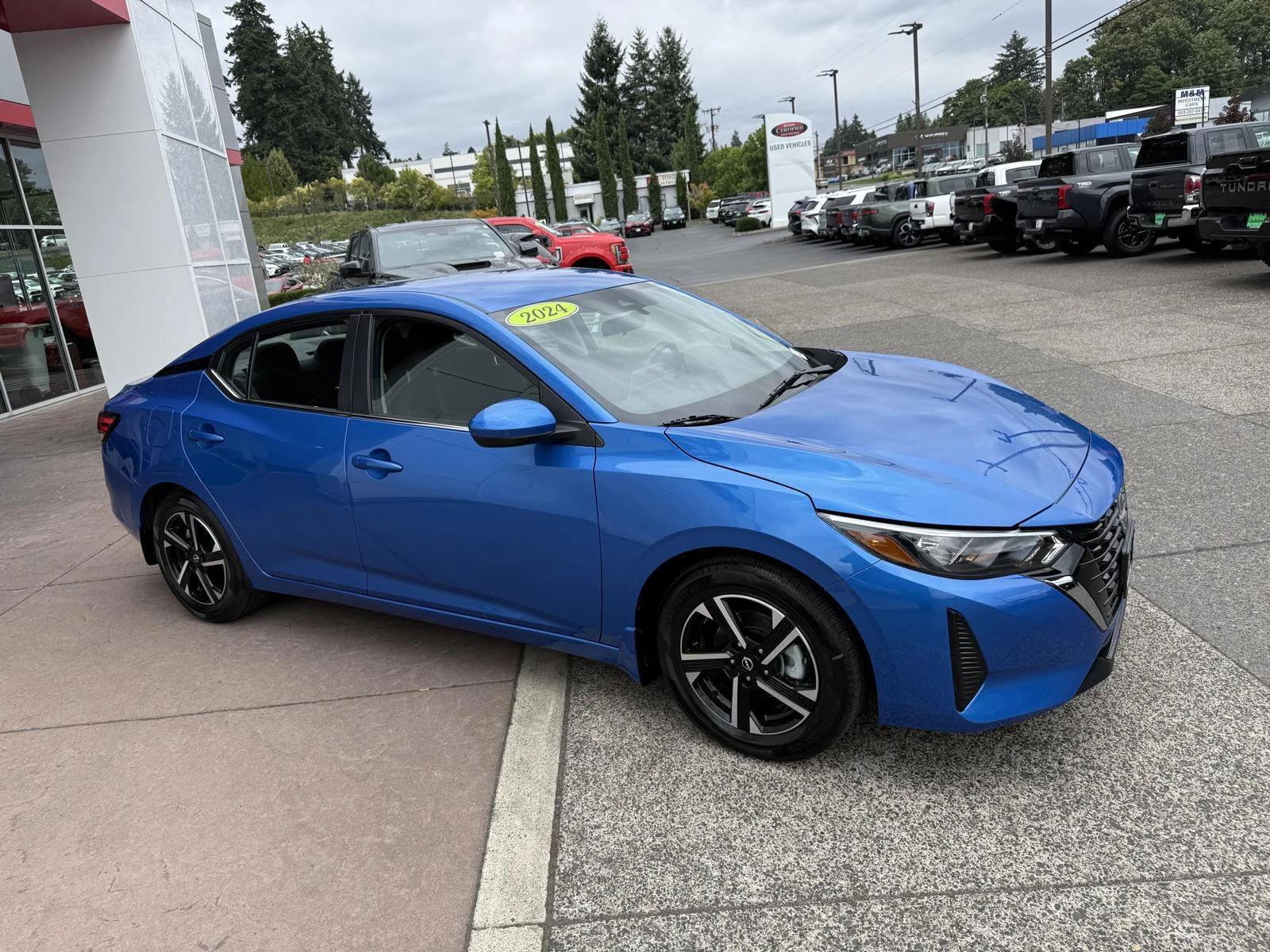 Used 2024 Electric Blue Metallic Nissan SV image 7