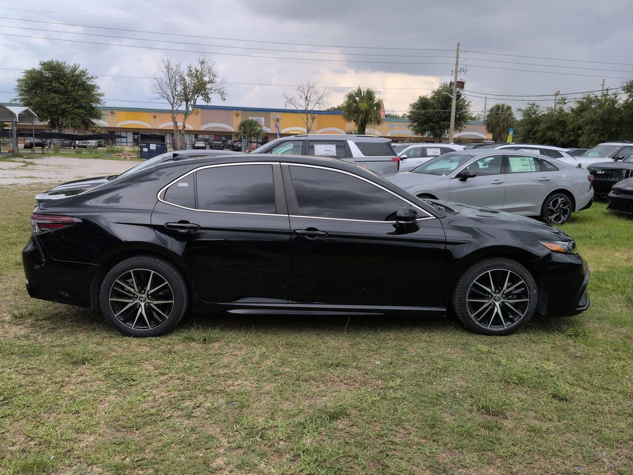 Used 2023 Midnight Black Metallic Toyota SE image 3
