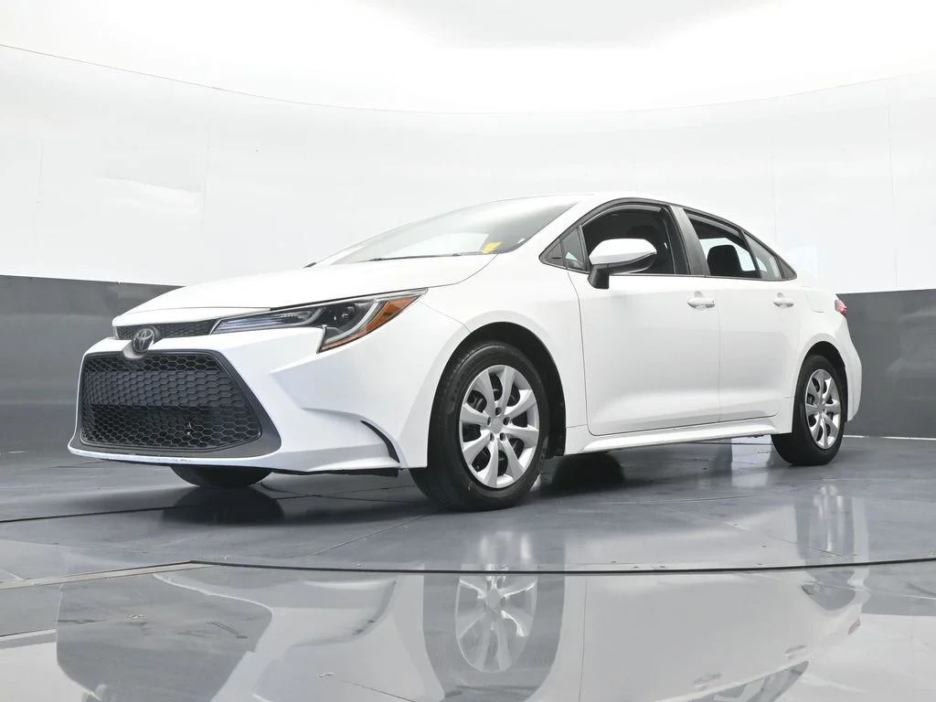 Used 2021 Super White Toyota LE image 44