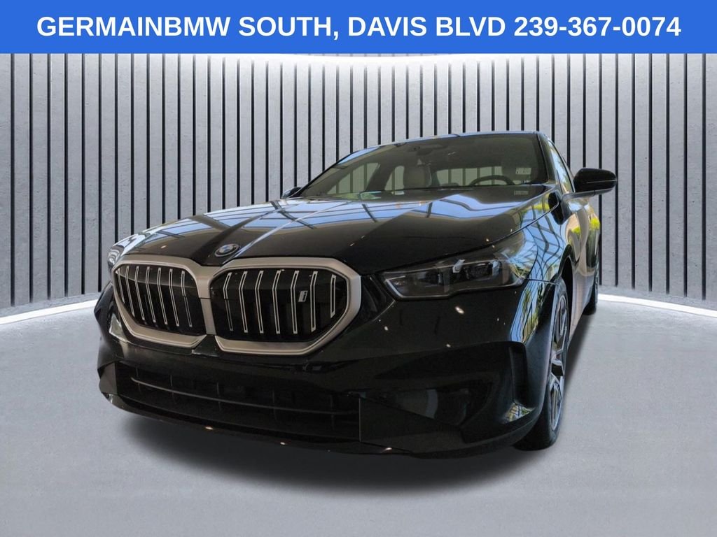 Used 2026 Black Sapphire Metallic BMW eDrive40 image 9